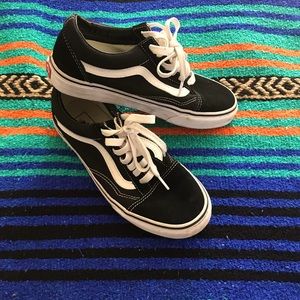Old school vans black and white. Excellent condition. Women size 7, men 5 1/2